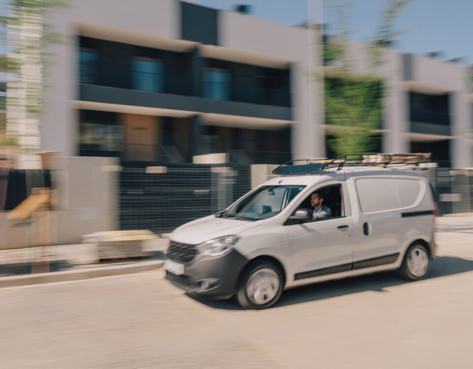 Service fleet van on the road showing real-world fleet operations and efficiency